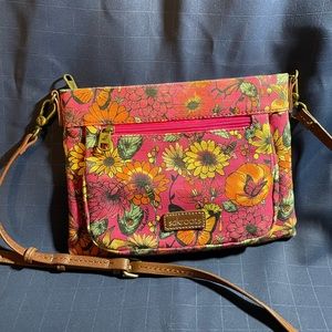 SakRoots bright pink canvas shoulder bag w/ colorful floral pattern & adj strap
